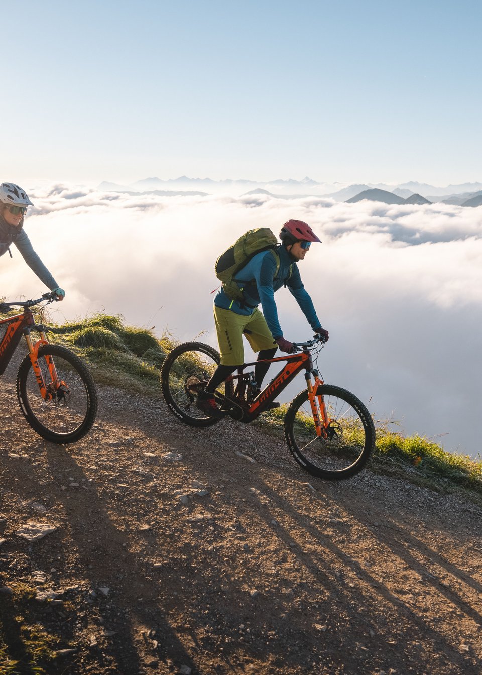 Mountain bikers riding downhill in the Kitzbühel Alps Mountain bikers riding downhill in the Kitzbühel Alps