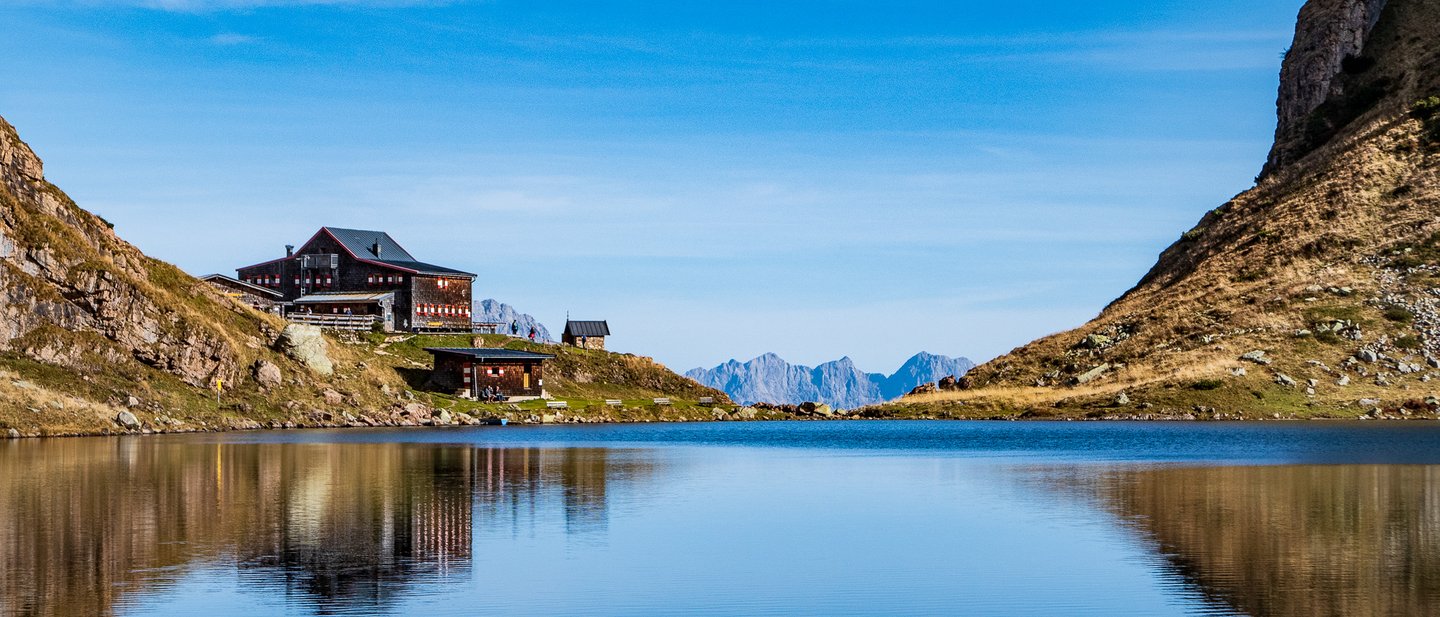 View of Wildseelodersee lake with Wildeseeloderhaus in the background View of Wildseelodersee lake with Wildeseeloderhaus in the background