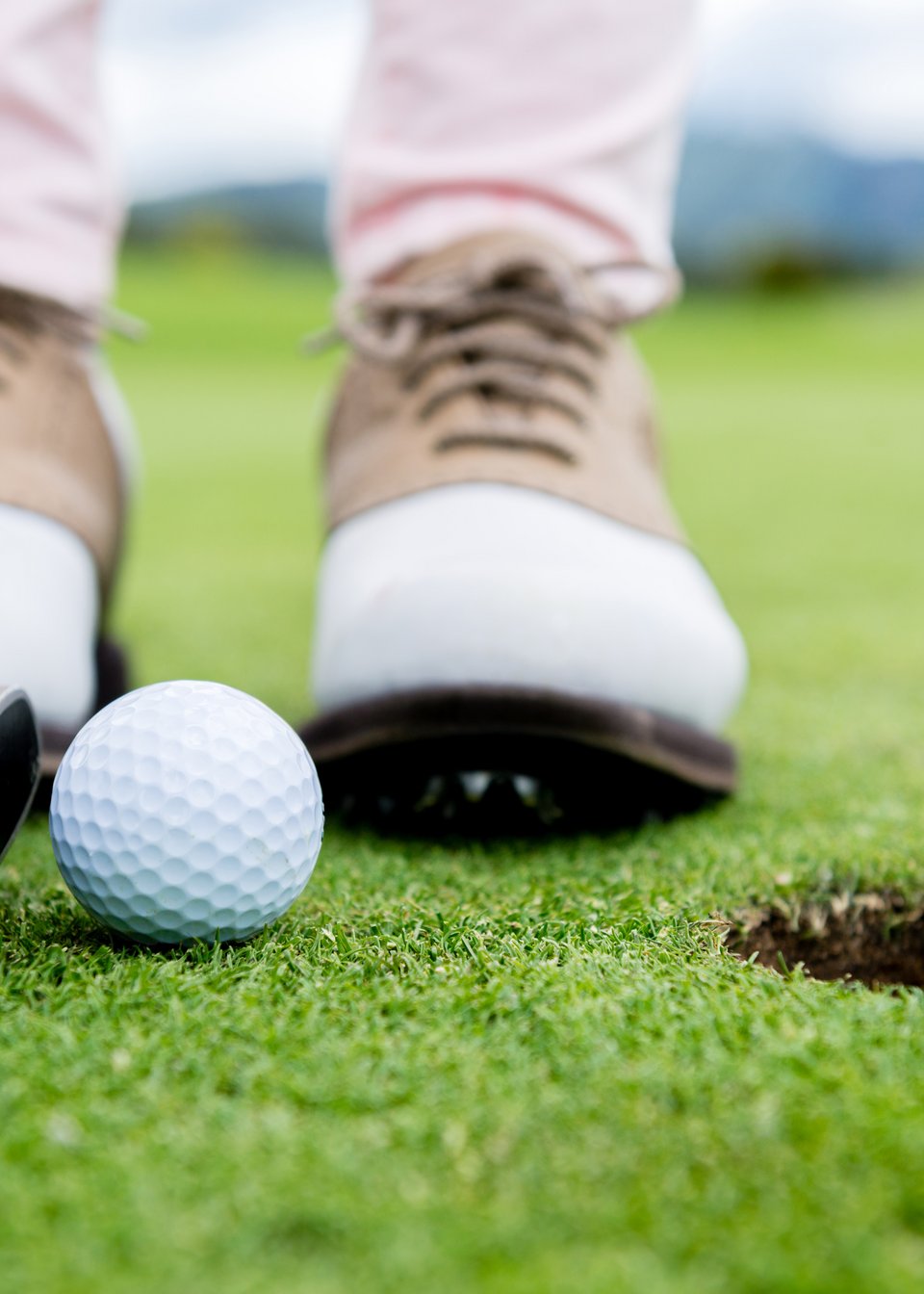 Person playing golf in Tyrol Person playing golf in Tyrol